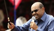 Sudanese President Omar al-Bashir delivers a speech during a visit to the village of Bilel in South Darfur, near the Kalma camp for displaced people, on September 22, 2017. AFP / Ashraf Shazly
 
