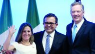 FILE PHOTO: Canadian Foreign Minister Chrystia Freeland, Mexico's Economy Minister Ildefonso Guajardo and U.S. Trade Representative Robert Lighthizer smile as they pose for a photo after addressing the media to close the second round of NAFTA talks involv