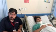Diana Pacheco (R) rests in a hospital bed, next to her husband Juan Jesus Garcia, after she was rescued from a collapsed office building, after an earthquake in Mexico City, Mexico September 22, 2017. REUTERS/Anthony Esposito