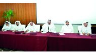 Qatar Chamber officials meeting with the representatives of private companies importing raw materials, yesterday.