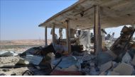 A wrecked building is seen after airstrikes hit a southern town of Idlib, Syria on September 22, 2017. (Hayyan Ebu Re?it - Anadolu Agency).