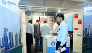 A visitor looks at a display at the 3rd edition of Buy Local Product Exhibition. 