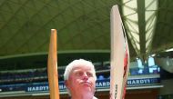 Former South African Batsman Barry Richards poses with the bat he made 325 in a single day at the Adelaide Oval and with the bat of David Warner of Australia during day one of the third Test match between Australia and New Zealand at Adelaide Oval in Adel