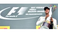 Mercedes’ British driver Lewis Hamilton celebrates on the podium after winning the Belgian Formula One Grand Prix in this August 2017 file picture.