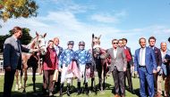 H E Sheik Mohammed Bin Khalifa Al Thani-owned Rajeh and his team pose for a photograph after the  colt won the Qatar Arabian Trophy des Poulains (Gr1 PA) at Saint-Cloud, France yesterday. INSET: H E Sheik Mohammed Bin Khalifa Al Thani receiving the winner