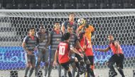 Al Rayyan’s Rodrigo Tabata shoots a free kick during their QNB Stars League match against Al Duhail at Al Sadd Stadium yesterday. Al Duhail beat Al Rayyan 5-3 in an eight-goal thriller.