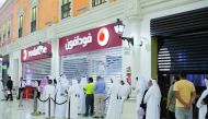 Customers at a Vodafone outlet for the iPhone 8 and iPhone 8 Plus phones.
