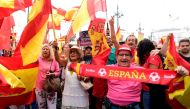People attend a demonstration against a referendum on independence for Catalonia, on October 01, 2017 in Madrid.  AFP / Javier SORIANO
