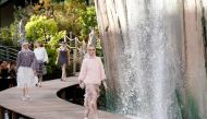 Models present creations for Chanel during the women's 2018 Spring/Summer ready-to-wear collection fashion show in Paris, on October 3, 2017. / AFP / Patrick KOVARIK
