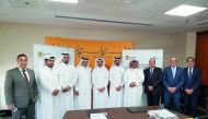 Officials of MEEZA and Q-Post during the launch of the partneship. 