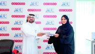 Waleed Al Sayed, CEO of Ooredoo Qatar, and Sheikha Athba Al Thani, Founder and CEO of Advanced Computing Company, at the agreement signing ceremony.