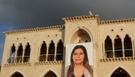 A picture of Rayya Chidiac hangs on her family's home in the village of Miziara, northern Lebanon, September 29, 2017. Picture taken September 29, 2017. REUTERS/ Omar Ibrahim
