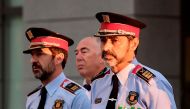 Josep Luis Trapero (R), chief of the Catalan police Mossos d'Esquadra who is under investigation for sedition, arrives to the High Court in Madrid on October 6, 2017.  AFP / JAVIER SORIANO
