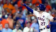 Houston Astros second baseman Jose Altuve hits a solo home run during the seventh inning against the Boston Red Sox in game one of the 2017 ALDS play-off baseball series at Minute Maid Park on Thursday.