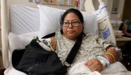FILE PHOTO: Paola Bautista, 39, from Fontana, California, sits in her hospital bed at Sunrise Hospital & Medical Center after being shot at the Route 91 music festival mass shooting next to the Mandalay Bay Resort and Casino in Las Vegas, Nevada, U.S. Oct