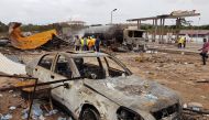 Burnt vehicles are pictured at the site of an explosion at a gas depot in Accra, Ghana October 8, 2017. REUTERS/Kwasi Kpodo
