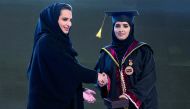 H H Sheikha Jawaher bint Hamad bin Suhaim Al Thani honouring a student of Qatar University’s (QU) women’s graduating Class of 2017, yesterday.