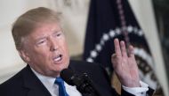 US President Donald Trump speaks about the Iran deal from the Diplomatic Reception room of the White House in Washington, DC, on October 13, 2017.   AFP / Brendan SMIALOWSKI 