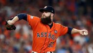 Houston Astros starting pitcher Dallas Keuchel (60) pitches during the first inning against the New York Yankees during game one of the 2017 ALCS playoff baseball series at Minute Maid Park.  Troy Taormina

