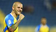 Al Gharafa’s Slovakian midfielder Vladimír Weiss celebrates after scoring his second goal against Al Khor yesterday.