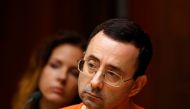 This file photo taken on June 23, 2017 shows former Michigan State University and USA Gymnastics doctor Larry Nassar seen in the 55th District Court where Judge Donald Allen Jr. bound him over in Mason, Michigan, to stand trial on 12 counts of first-degre