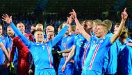 Iceland’s players Johann Berg Gudmundsson (left) and Alfred Finnbogason celebrate after the FIFA World Cup 2018 qualification match against Kosovo in Reykjavik, Iceland in this October 9 file picture.