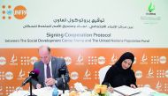 NAMA Center’s Acting Executive-Manager, Maryam bint Abdullatif Al Mannai, signs the agreement with the UNFPA Director for the Arab States Regional Office, Dr. Luay Shabaneh, at NAMA Center’s headquarters. 