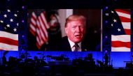 President Donald Trump in a video message as five former U.S. presidents, attended a concert at Texas A&M University benefiting hurricane relief efforts in College Station, Texas, U.S., October 21, 2017. REUTERS/Richard Carson
