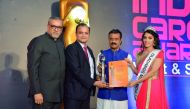 A Qatar Airways Cargo official receiving the ‘Overall Carrier of the Year’ award in the industry choice category at the Payload Asia Gala Dinner and Awards Ceremony in Singapore.