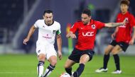 Al Sadd captain Xavi Hernandez (left) fights for the ball possession against Al Rayyan’s player during their ‘Qatari Clasico’ in this file picture.