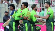 Pakistani cricketers celebrate their victory at the end of the fifth one day international match against Sri Lanka at Sharjah Cricket Stadium in Sharjah, UAE in this file photo.