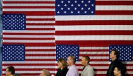 A file photo of people listening as US President Donald Trump speaks about tax reform in Harrisburg, Pennsylvania, U.S., October 11, 2017. Reuters/Joshua Roberts 