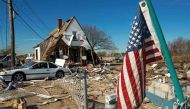 A file photo of a house seen with its entire first floor washed away, as well as the entire surrounding area demolished when Hurricane Sandy hit the coastal estuary in the Oakwood Beach area of Staten Island, New York, November 6, 2012. AFP / Paul J.RICHA