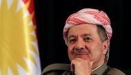 (FILES) This file photo taken on September 24, 2017 shows Iraqi Kurdish leader Massud Barzani, seated next to a Kurdish flag, during a press conference in Arbil, the capital of the autonomous Kurdish region of northern Iraq.  AFP / SAFIN HAMED

