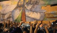 A demonstration  against the bomb attack in front of the Coptic Orthodox Church of the Two Saints in Alexandria, January 2,  2011 (Reuters / Asmaa Waguih) 