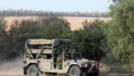 Israeli soldiers patrol close to the Israeli border with the Gaza Strip on October 30, 2017, near Kibbutz Kissufim in southern Israel. A Palestinian was killed and nine others injured when Israel blew up a tunnel stretching from the Gaza Strip into its te