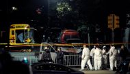 Police investigate the scene of a pickup truck attack on the West Side Highway in Manhattan, New York, U.S., October 31 2017. REUTERS/Andrew Kelly
