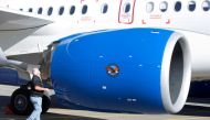 FILE PHOTO: An employee inspects the engine of a C Series plane at Bombardier's plant in Mirabel, Quebec Canada, October 20, 2017. REUTERS/Christinne Muschi/File Photo