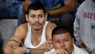 Many of the inmates questions to candidates focused on crime prevention and overall quality of life for Costa Ricans. AFP Photo / Ezequiel Becerra.