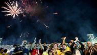 Fans from Arbil football club celebrate winning the Iraqi league in 2012, but now the team could be sidelined as the crisis between Baghdad and Kurdistan spills over into sports. / AFP.