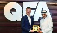 The President of the Qatar Football Association (QFA), Sheikh Hamad bin Khalifa bin Ahmed Al Thani hands over a memento to President of the Football Association of Iceland, Gudni Bergsson in Doha yesterday.