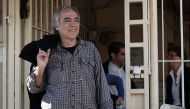 Convicted assasin of extremist group November 17, Dimitris Koufontinas, exits prison in Athens for a controversial two-day leave (AFP /Stelios Misinas)
