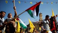 Fatah supporters take part in a rally marking the death anniversary of late Palestinian leader Yasser Arafat, in Gaza City November 11, 2017. REUTERS/Suhaib Salem