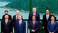 (Front L to R) China's President Xi Jinping, Vietnam's President Tran Dai Quang, Indonesia's President Joko Widodo, Japan's Prime Minister Shinzo Abe, (back L to R) Philippine President Rodrigo Duterte, Russia's President Vladimir Putin, US President Dona