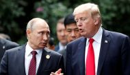 An image of US President Donald Trump (R) and Russia's President Vladimir Putin talk during the family photo session at the APEC Summit in Danang, Vietnam November 11, 2017. REUTERS/Jorge Silva
