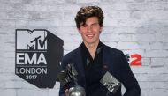 An image of Canadian singer Shawn Mendes posing with his awards during the 2017 MTV Europe Music Awards at Wembley Arena in London, Britain November 12, 2017. REUTERS//Hannah McKay