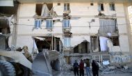 Earthquake survivors waits at the outside of the damaged and collapsed buildings in Sarpol-e Zahab town of Kermanshah, Iran on November 13, 2017 following a 7.3 magnitude earthquake that hit the Iraq and Iran. Fatemeh Bahrami - Anadolu Agency
