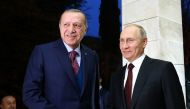 Turkish President Recep Tayyip Erdogan (L) and Russian President Vladimir Putin (R) shake hands during their meeting at the State Residence of Russian President in Sochi, Russia on November 13, 2017. ( Kayhan Özer - Anadolu Agency )
