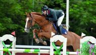 Star of the day, Young Qatari rider Salman Mohammed Al Emadi guides his 16-year-old gelding Zorro Z over an obstacle during the 145cm class event of the QNB Qatar International Show Jumping Championship which kicked off at the Qatar Equestrian Federation’