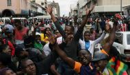 Protesters calling for Zimbabwean President Robert Mugabe to step down take to the streets in Harare, Zimbabwe November 18, 2017. REUTERS/Philimon Bulawayo